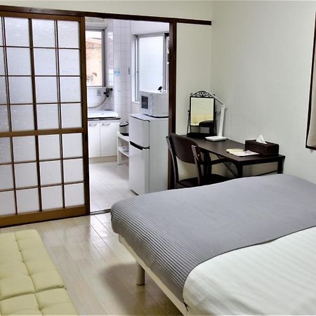 Osaka U-Shuku Apartment Bagian luar foto