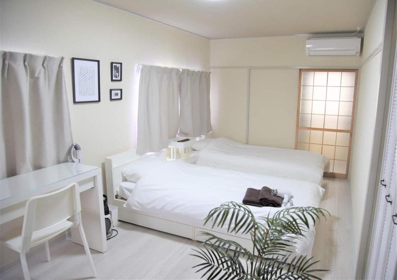 Osaka U-Shuku Apartment Bagian luar foto