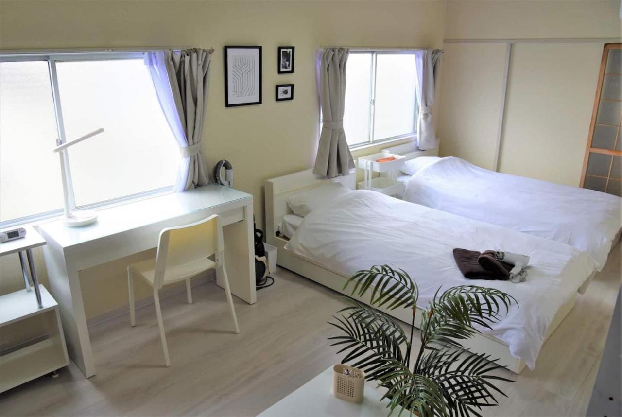 Osaka U-Shuku Apartment Bagian luar foto