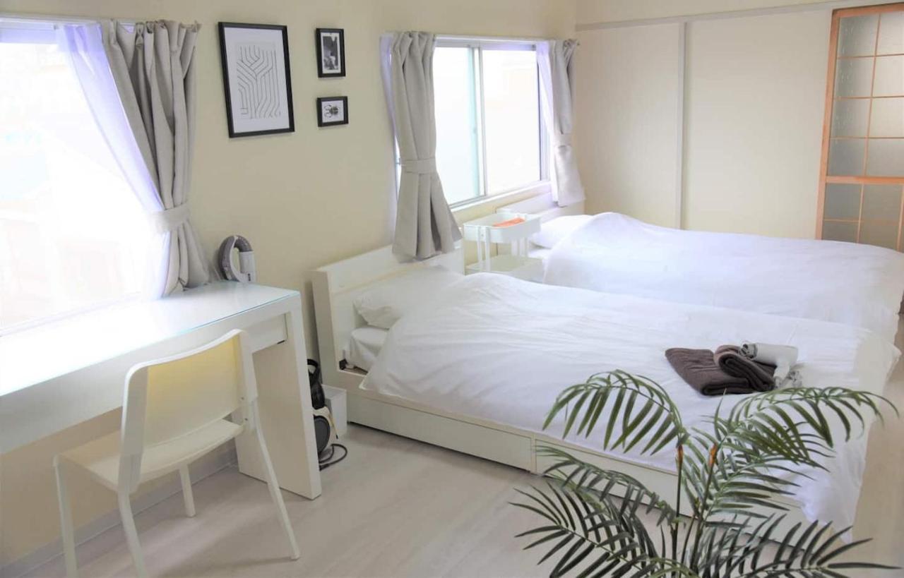 Osaka U-Shuku Apartment Bagian luar foto