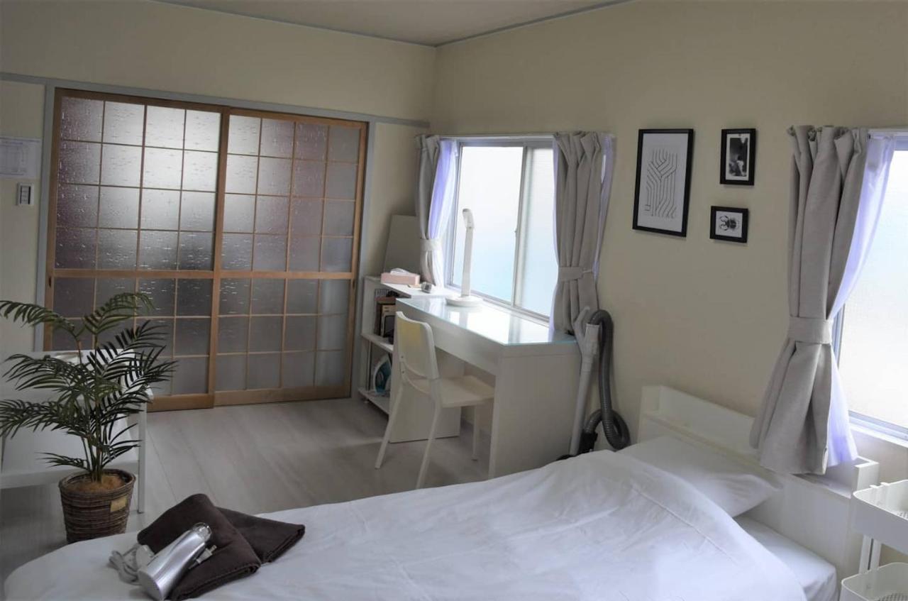 Osaka U-Shuku Apartment Bagian luar foto