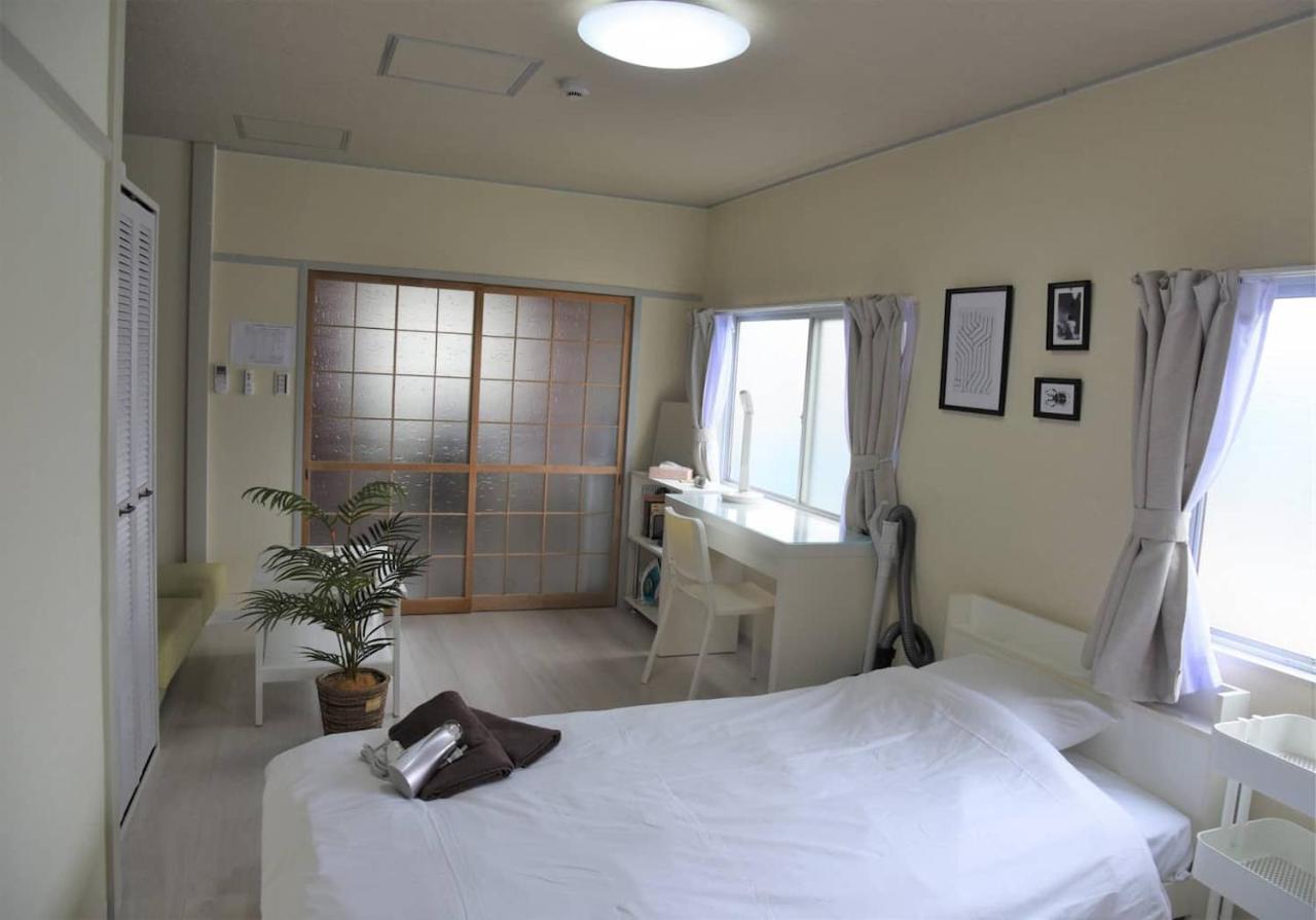 Osaka U-Shuku Apartment Bagian luar foto