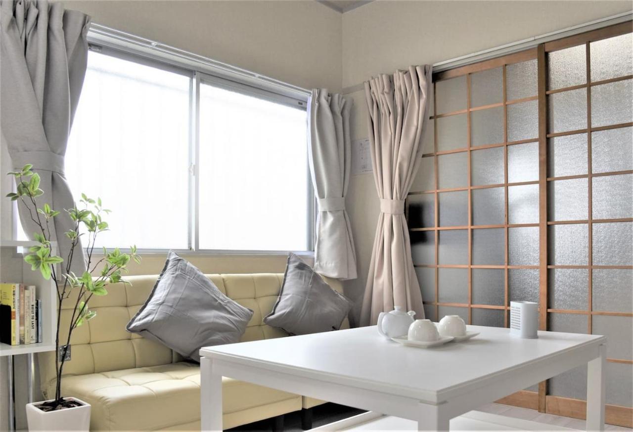 Osaka U-Shuku Apartment Bagian luar foto