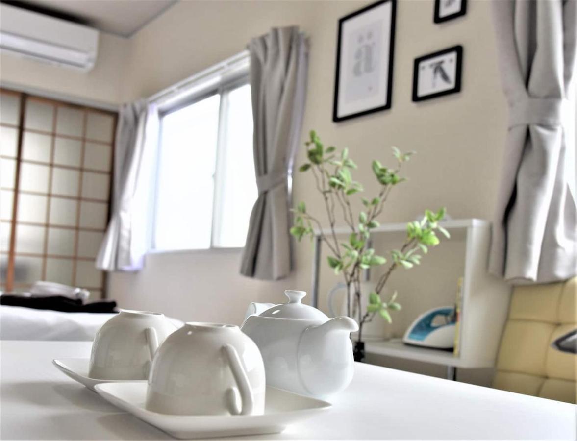Osaka U-Shuku Apartment Bagian luar foto