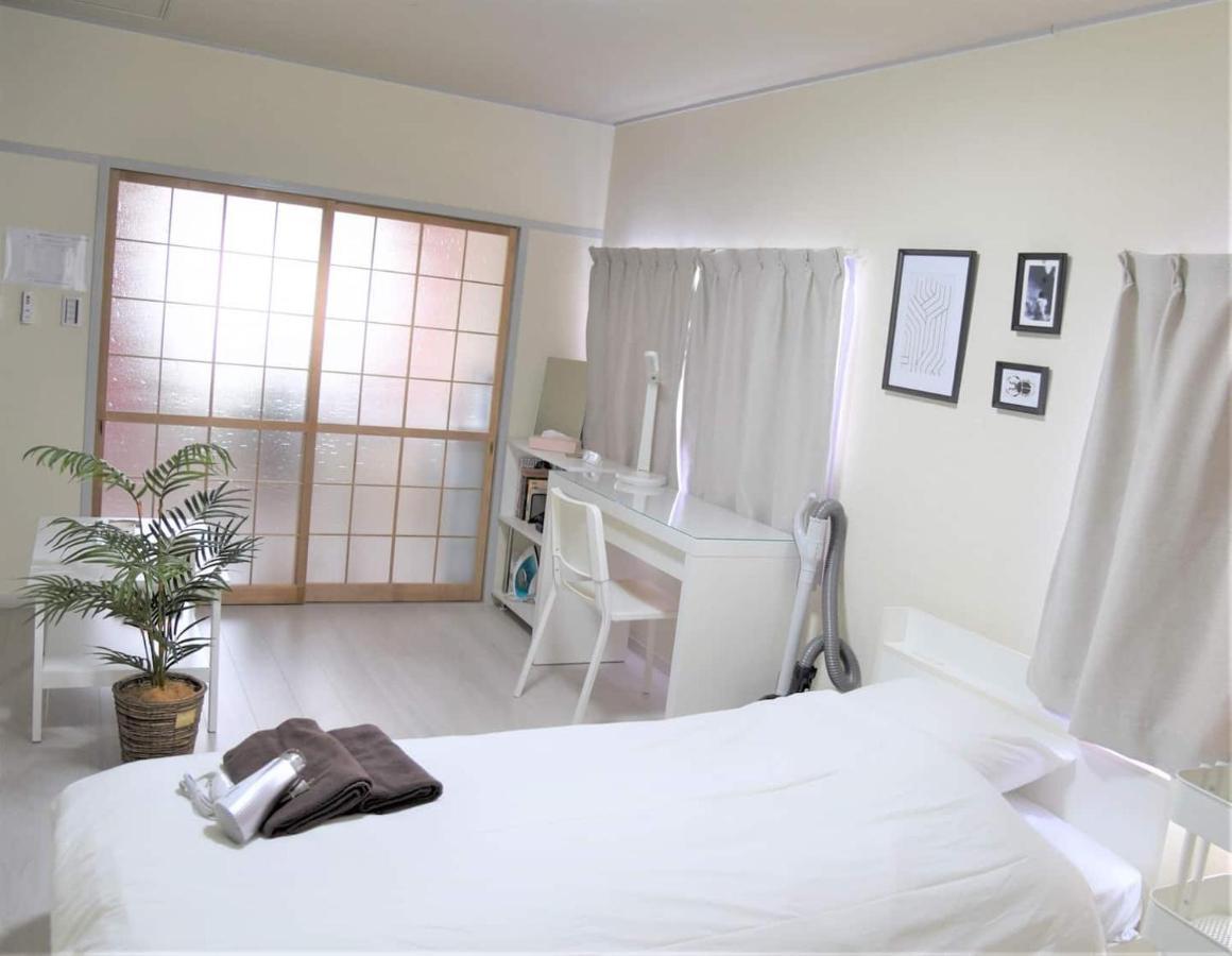 Osaka U-Shuku Apartment Bagian luar foto