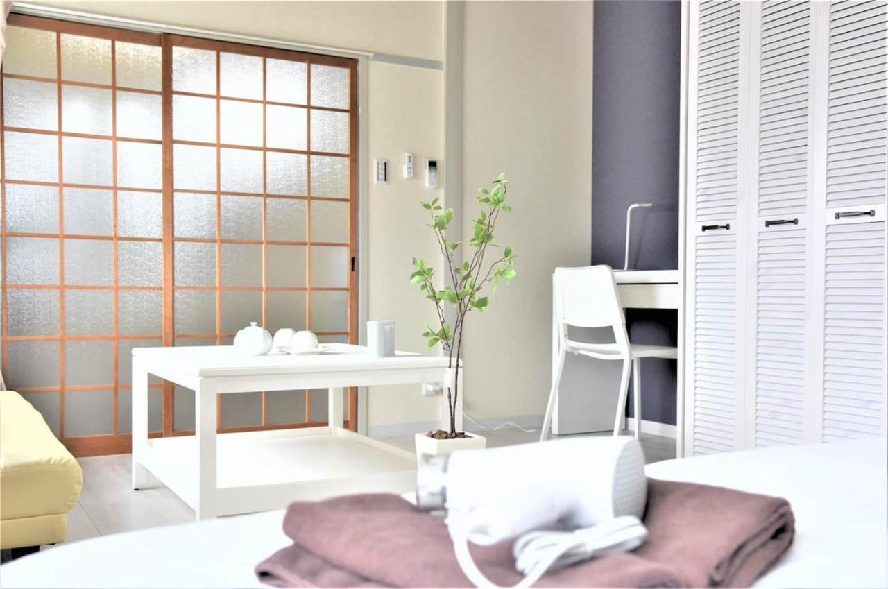 Osaka U-Shuku Apartment Bagian luar foto