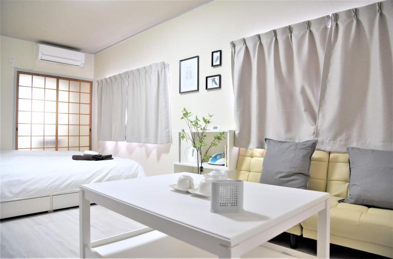 Osaka U-Shuku Apartment Bagian luar foto