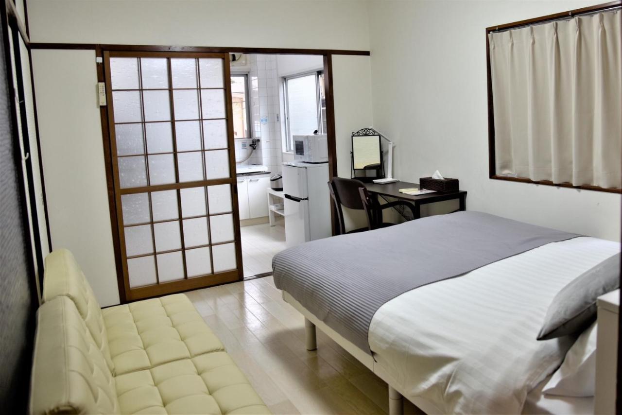 Osaka U-Shuku Apartment Bagian luar foto