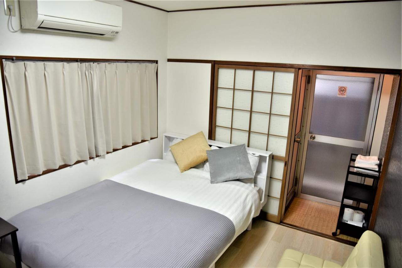 Osaka U-Shuku Apartment Bagian luar foto