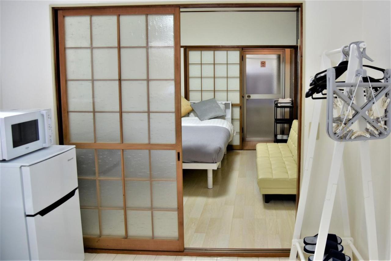 Osaka U-Shuku Apartment Bagian luar foto