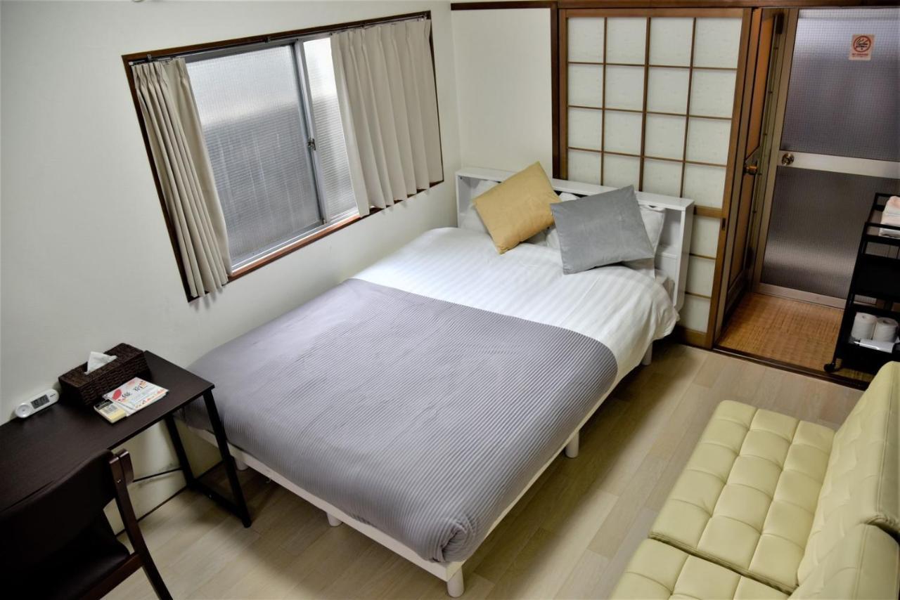 Osaka U-Shuku Apartment Bagian luar foto