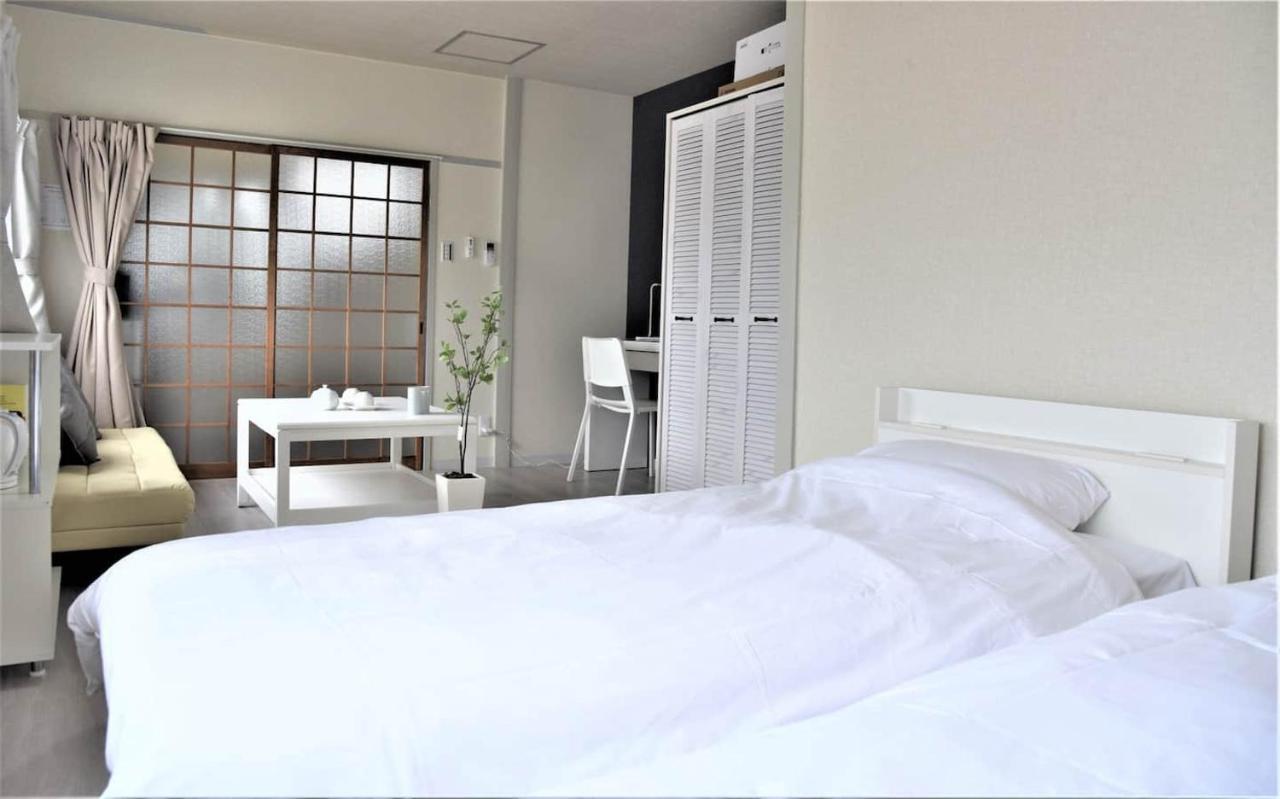 Osaka U-Shuku Apartment Bagian luar foto