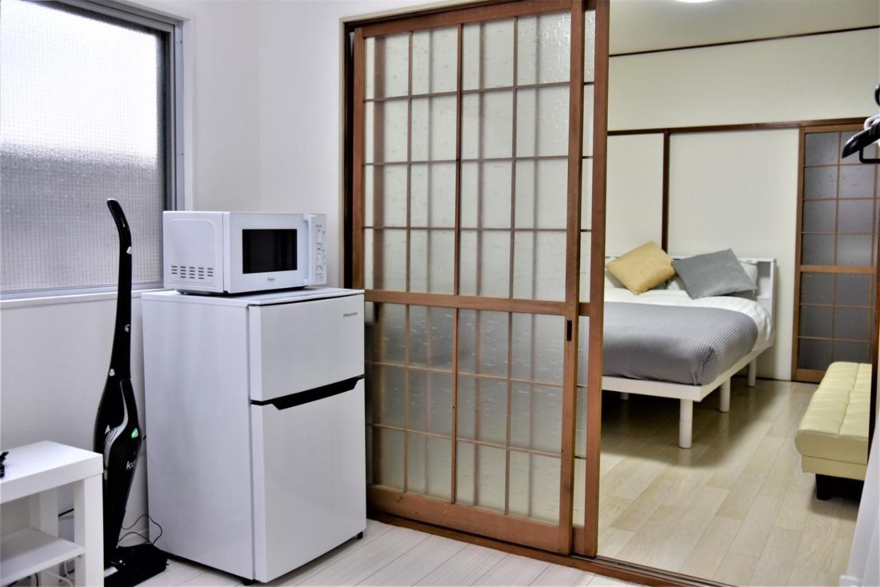Osaka U-Shuku Apartment Bagian luar foto