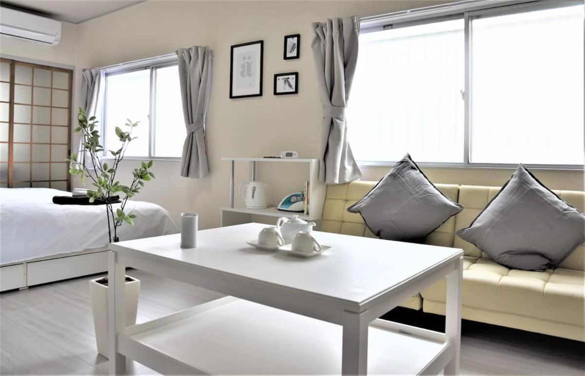 Osaka U-Shuku Apartment Bagian luar foto