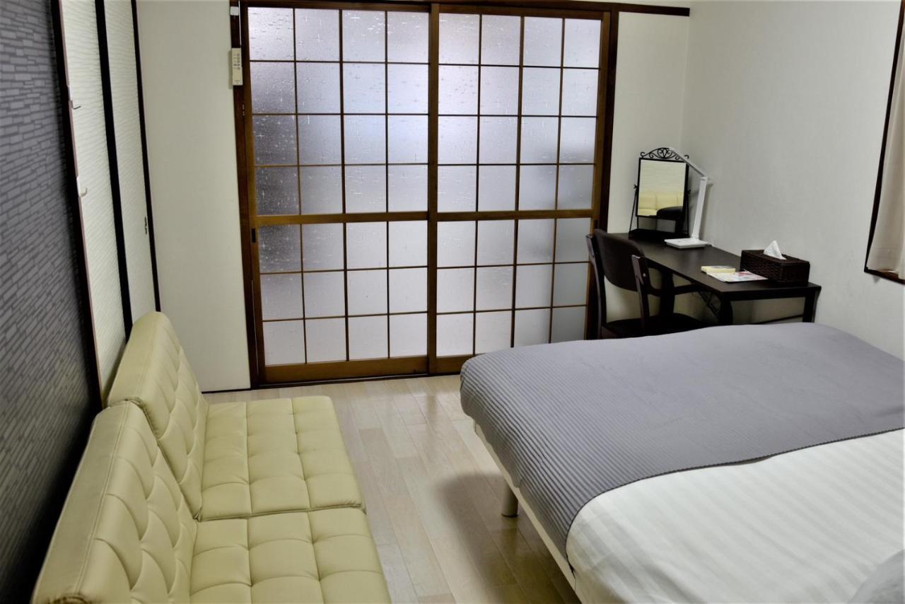 Osaka U-Shuku Apartment Bagian luar foto