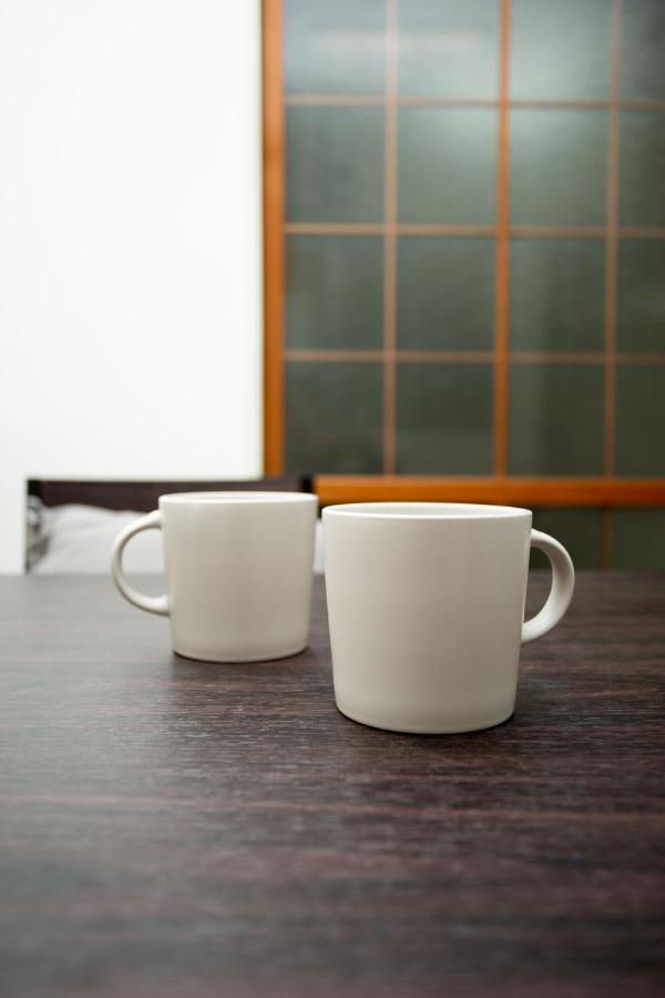 Osaka U-Shuku Apartment Bagian luar foto