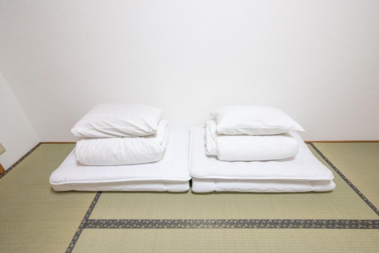 Osaka U-Shuku Apartment Bagian luar foto