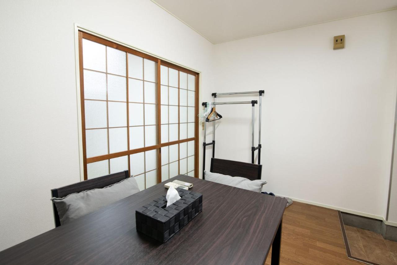 Osaka U-Shuku Apartment Bagian luar foto
