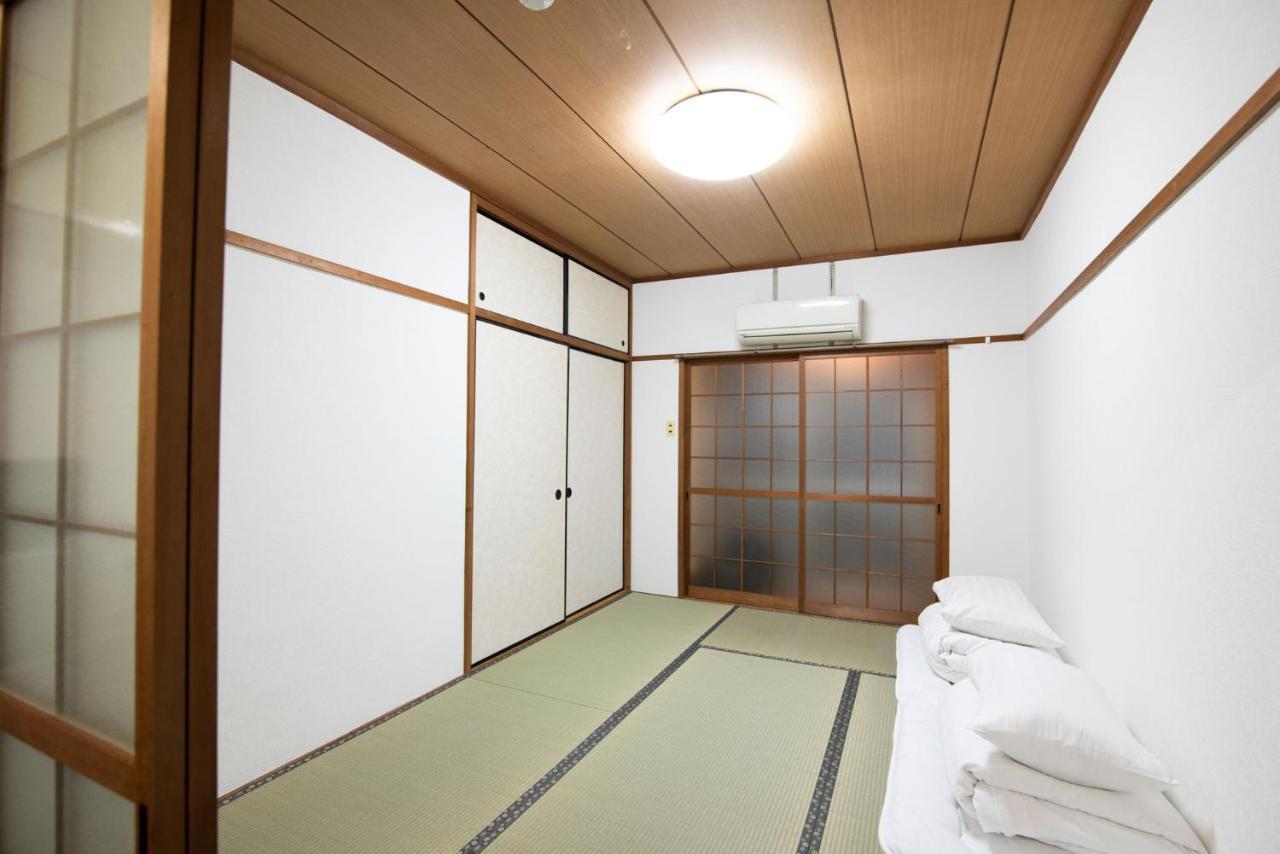 Osaka U-Shuku Apartment Bagian luar foto
