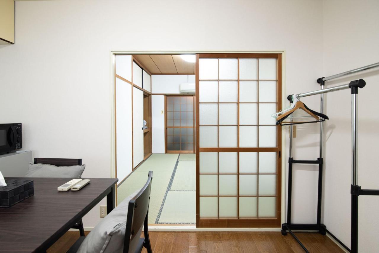 Osaka U-Shuku Apartment Bagian luar foto