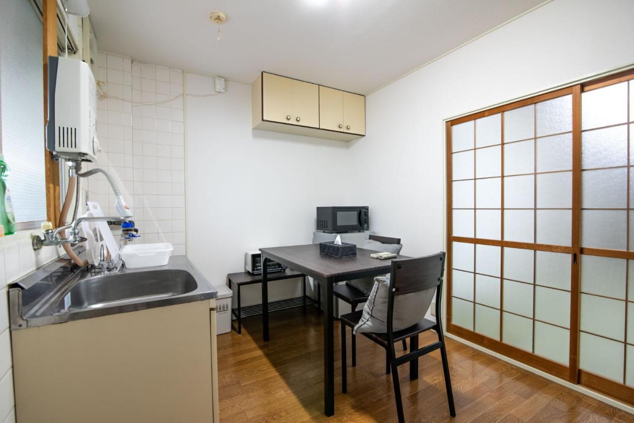 Osaka U-Shuku Apartment Bagian luar foto