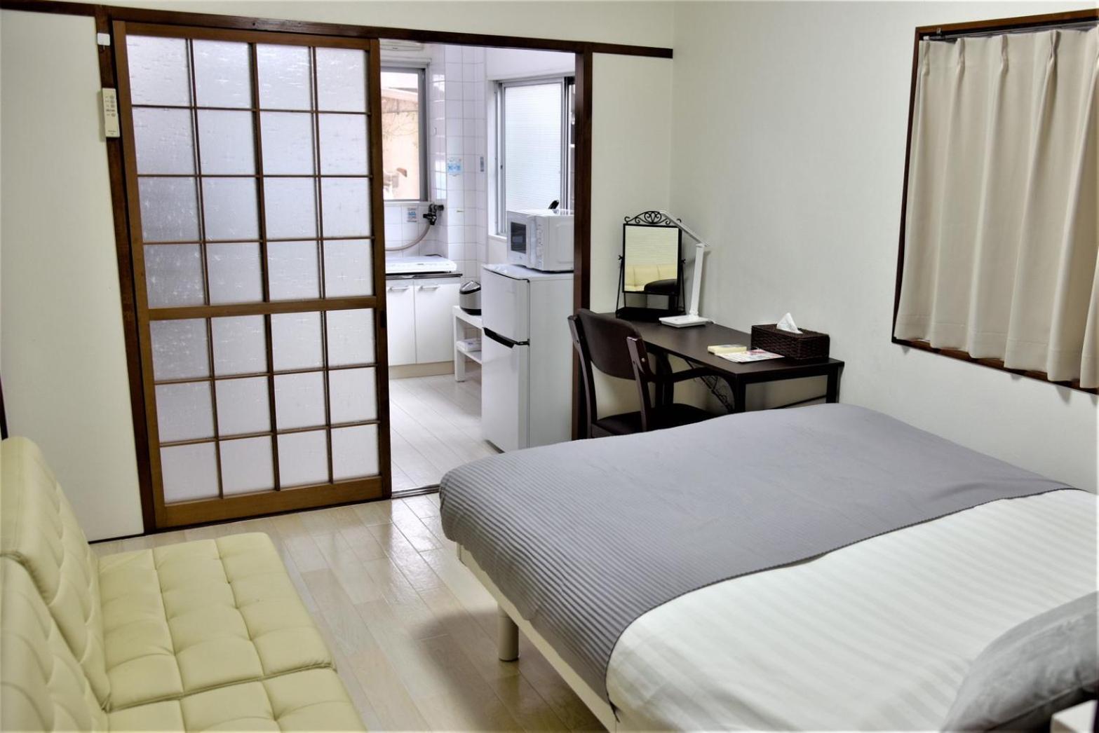 Osaka U-Shuku Apartment Bagian luar foto