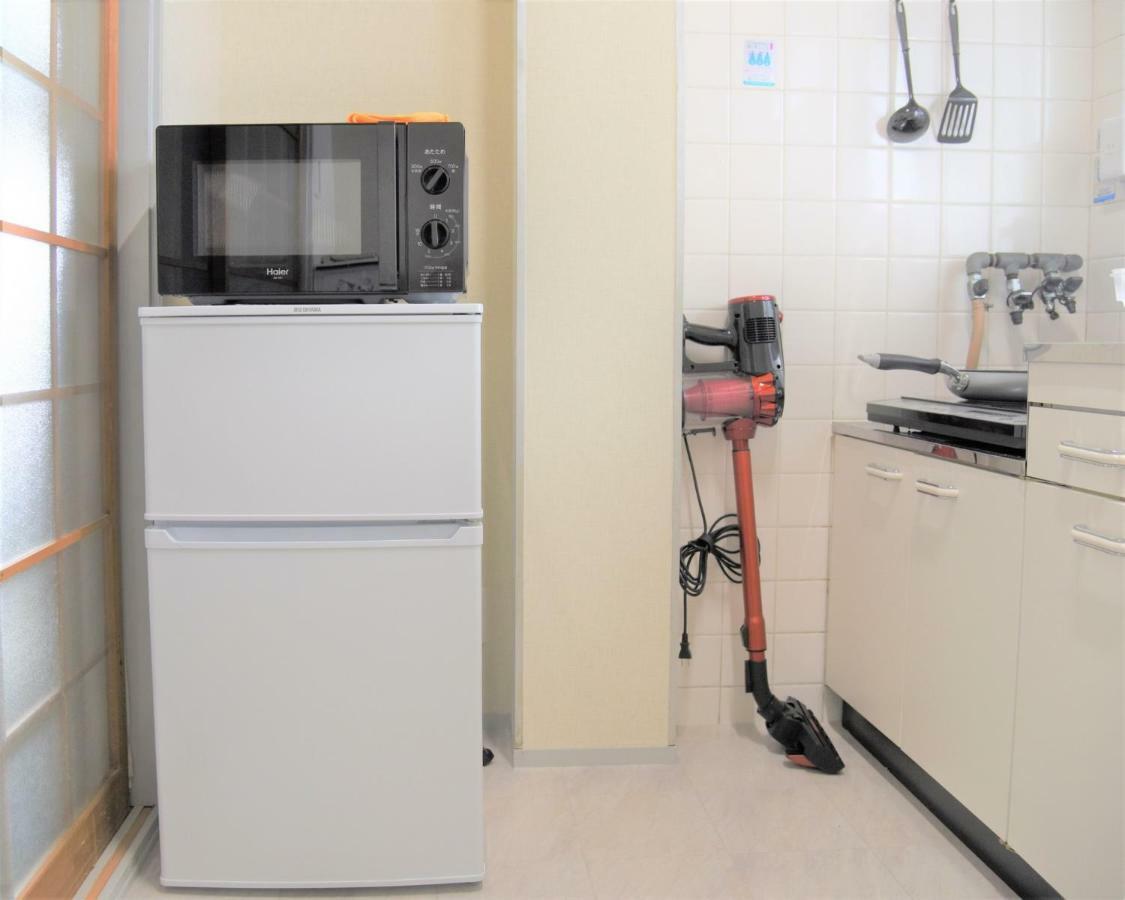 Osaka U-Shuku Apartment Bagian luar foto