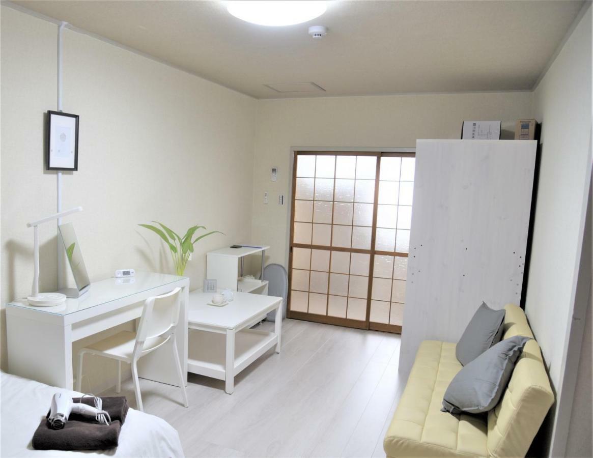 Osaka U-Shuku Apartment Bagian luar foto