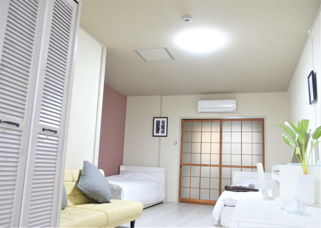 Osaka U-Shuku Apartment Bagian luar foto
