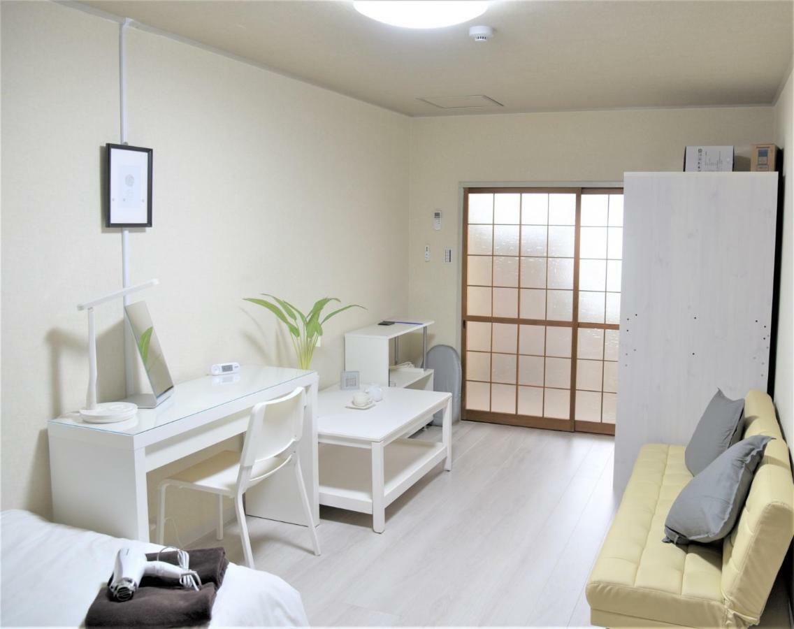 Osaka U-Shuku Apartment Bagian luar foto