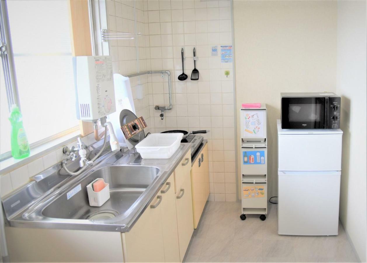 Osaka U-Shuku Apartment Bagian luar foto
