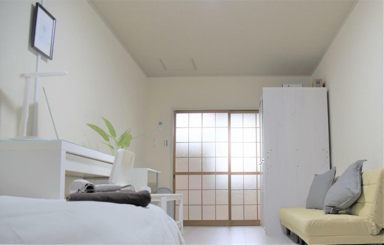 Osaka U-Shuku Apartment Bagian luar foto