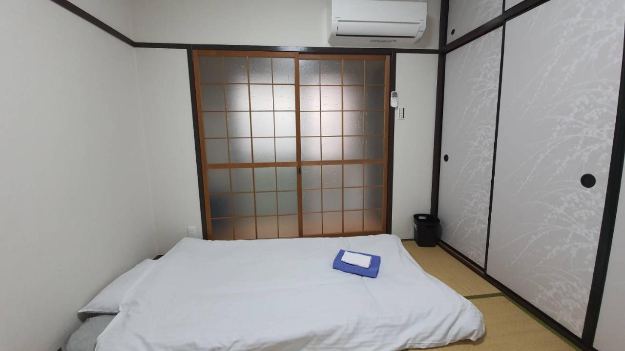 Osaka U-Shuku Apartment Bagian luar foto
