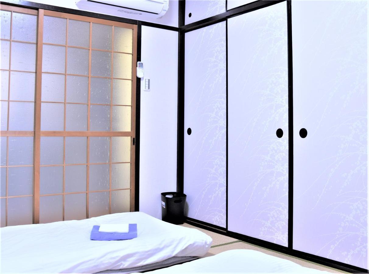 Osaka U-Shuku Apartment Bagian luar foto