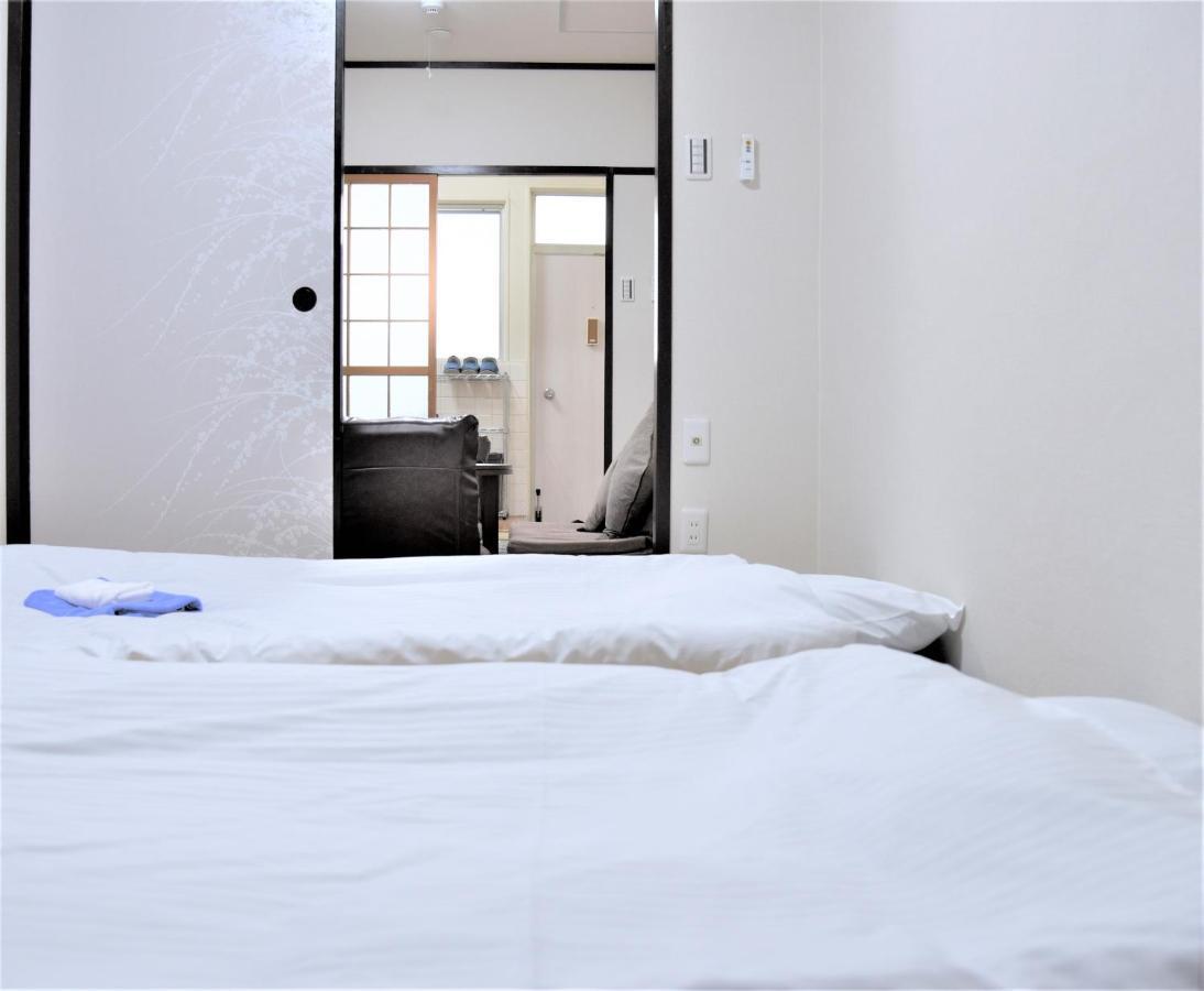 Osaka U-Shuku Apartment Bagian luar foto